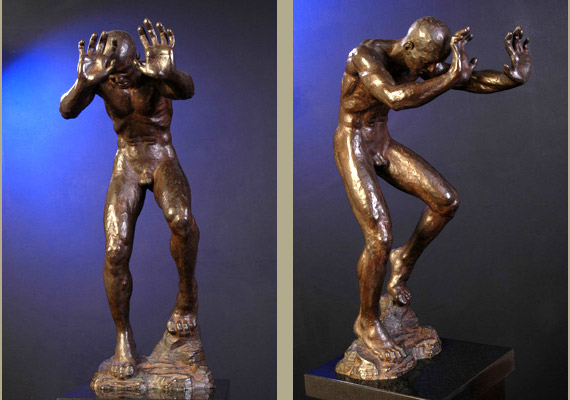 Sculpture of a standing man.