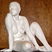 Thumbnail of a female seated sculpture.